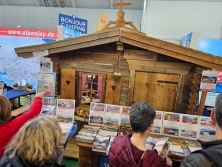Prospektpräsentation Messestand Urlaub in den Alpen