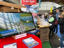 Gewinnspiel am Messestand Urlaub in den Alpen