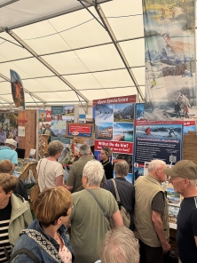 Urlaubsgutscheine gewinnen am Messestand Urlaub in den Alpen