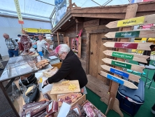 Spezialitäten am Messestand Urlaub in den Alpen