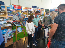 Glücksrad am Messestand Urlaub in den Alpen